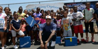Hip Hop artist Chris Brown attends the ‘WE US: Walk Everywhere in Unity’s Shoes’ event at Crenshaw Senior High School on July 6, 2013 in Los Angeles, California. (Photo by Michael Buckner/Getty Images for Unity Campaign)