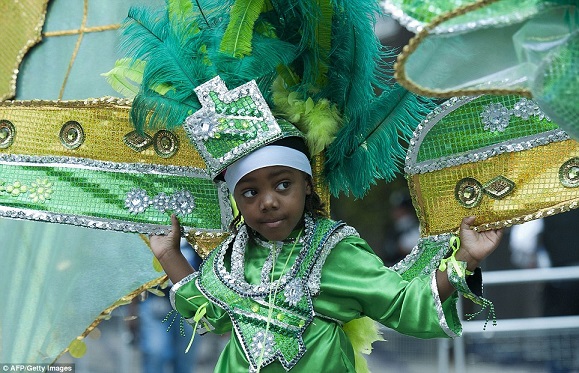 Don’t rain on our parade! Notting Hill Carnival kicks off as 1 million revellers rock Europe’s biggest street party