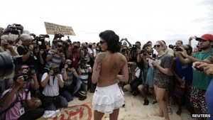 Brazilian women defy authorities and stage a topless protest