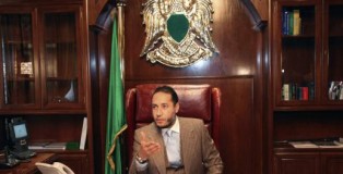 Saadi Gaddafi, son of Libyan leader Muammar Gaddafi, speaks during a news conference at his office in Tripoli in this January 31, 2010 file photo. Niger has extradited Muammar Gaddafi's son Saadi, who just arrived inTripoli and was brought to a prison, the Libyan government said on March 6, 2014. The North African country had been seeking the extradition of Saadi, who had fled to the southern neighbour nation after the toppling of Gaddafi in a NATO-backed uprising in 2011.    REUTERS/Ismail Zetouny/Files  (LIBYA - Tags: POLITICS)