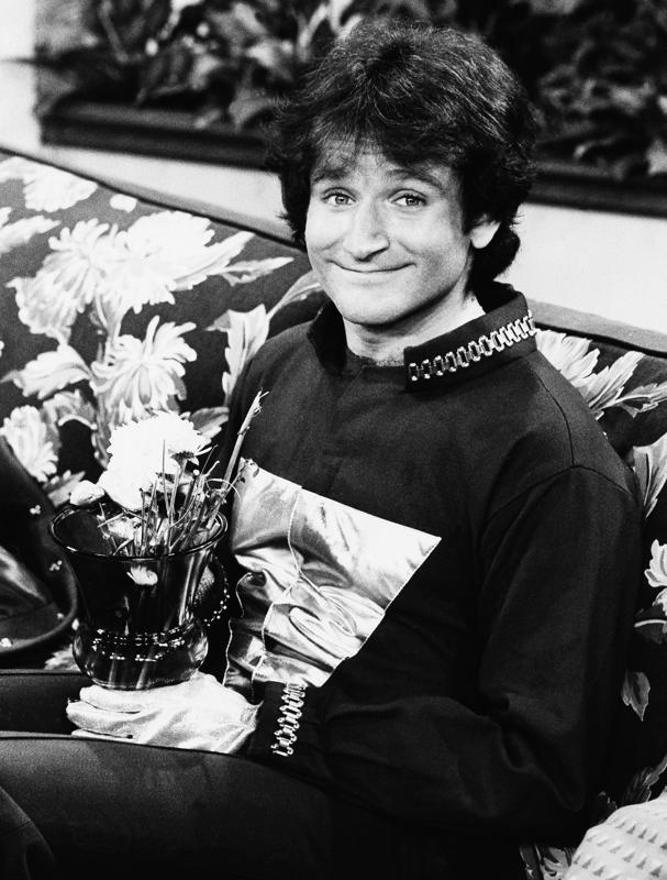 FILE - This 1978 file photo originally released by ABC shows actor Robin Williams on the set of ABCs "Mork and Mindy." Williams, whose free-form comedy and adept impressions dazzled audiences for decades, has died in an apparent suicide. He was 63. The Marin County Sheriff’s Office said Williams was pronounced dead at his home in California on Monday, Aug. 11, 2014. The sheriff’s office said a preliminary investigation showed the cause of death to be a suicide due to asphyxia. (AP Photo/ABC, File) 