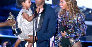 Blue Ivy Carter, Jay-Z and Beyonce onstage during the 2014 MTV Video Music Awards. (credit: Mark Davis/Getty Images)
