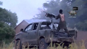 A screengrab taken on August 24, 2014 from a video released by Boko Haram and obtained by AFP shows alleged members of the Nigerian Islamist extremist group during fighting at an undisclosed location (AFP Photo/) 