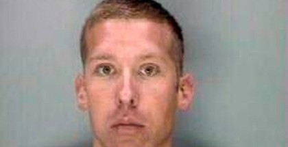 In this Sept. 20014 photo released by the South Carolina State Police, State trooper Sean Groubert poses for a booking photo. Groubert, 31, was charged Wednesday, Sept. 24, 2014, with assault and battery of a high and aggravated nature. He faces up to 20 years in prison if convicted. Officials say a former South Carolina state trooper is charged with a felony in the shooting of an unarmed man during a traffic stop earlier this month. (AP Photo/South Carolina State Police)