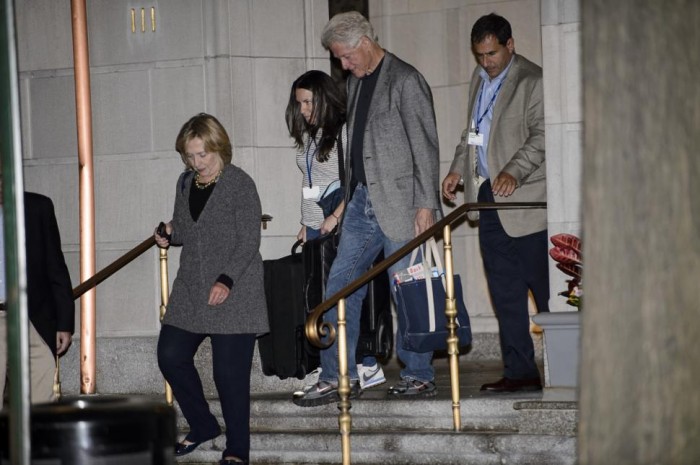 Bill, Hillary Clinton beam while leaving Lenox Hospital after birth of new granddaughter