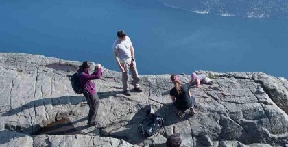 Parents allow baby to be dangerously close to the edge of Pulpit Rock, a 1,982-foot cliff. Photo by Fred Sirevåg
