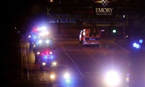 An ambulance carrying Ebola victim Amber Vinson arrives with a security detail at Emory University Hospital in Atlanta on Wednesday night. Photograph: Tami Chappell/Reuters 