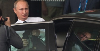 Vladimir Putin leaves his hotel on the way to Brisbane airport. Photograph: Jason Reed/Reuters