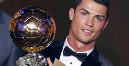 Portugal's Cristiano Ronaldo holds his trophy after being awarded the FIFA Ballon d'Or 2013 in Zurich January 13, 2014. Portugal and Real Madrid forward Cristiano Ronaldo was named the world's best footballer for the second time on Monday, preventing his great rival Lionel Messi from winning the award for a fifth year in a row.
