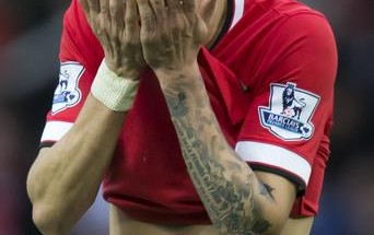 Manchester United's Angel Di Maria reacts after a missed opportunity before being substituted at half time during his team's English Premier League soccer match between Manchester United and Sunderland at Old Trafford Stadium, Manchester, England, Saturday Feb. 28, 2015. (AP Photo/Jon Super)