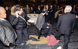 In this handout image provided by The Asia Economy Daily newspaper, the man identified as Kim Ki-jong is being arrested at the site where U.S. Ambassador to South Korea Mark Lippert was attacked on March 5, 2015 in Seoul, South Korea. Ambassador Lippert was attacked with a razor blade by a man at a venue where he was going to give a lecture. The attacker reportedly identified himself as a representative for a watchdog organization of the disputed island Dokdo/Takeshima. (The Asia Economy Daily/Getty Images) 