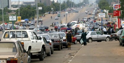 Motorists rush to buy petrol in Abuja during an earlier fuel shortage (AFP Photo/Pius Utomi Ekpei)